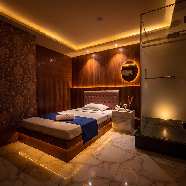 Warm, dimly lit private spa suite at Veloura Luxury Spa